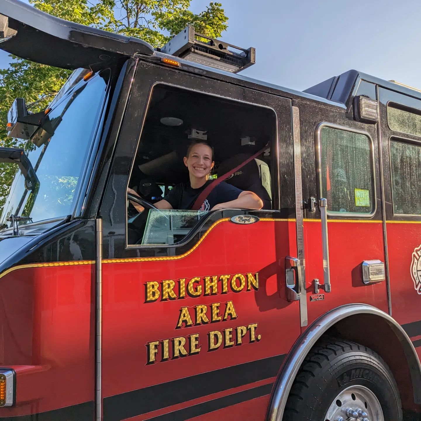 Woman driving a fire truck